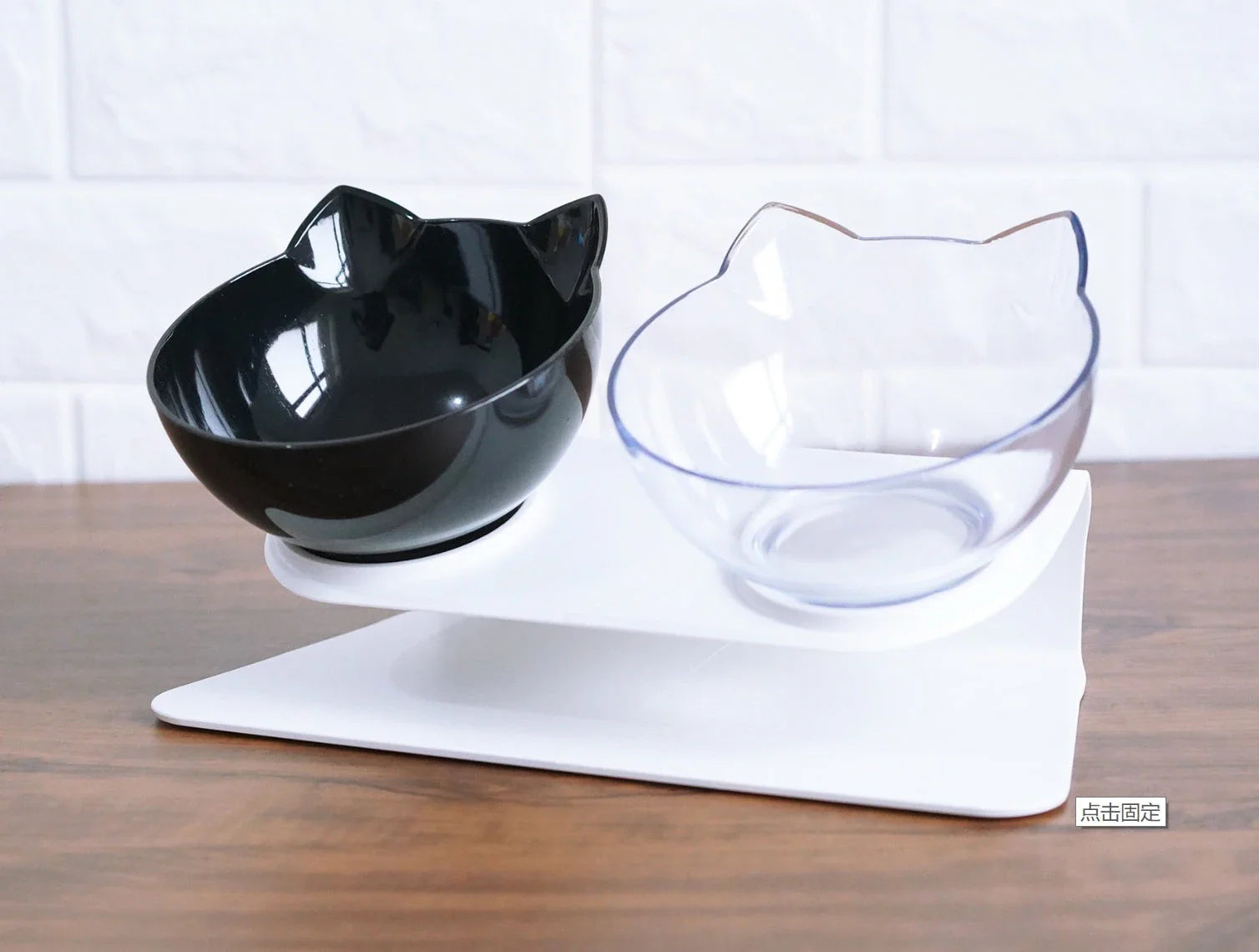 Inclined transparent cat food bowl with a gently sloped base and ergonomic design for whisker-friendly dining