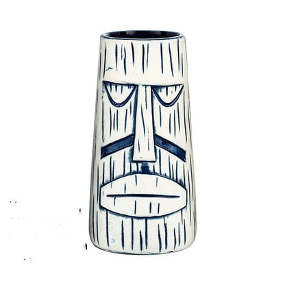 A ceramic tiki mug with a 3D decorative face, perfect for tropical cocktails, smoothies, and other chilled beverages.