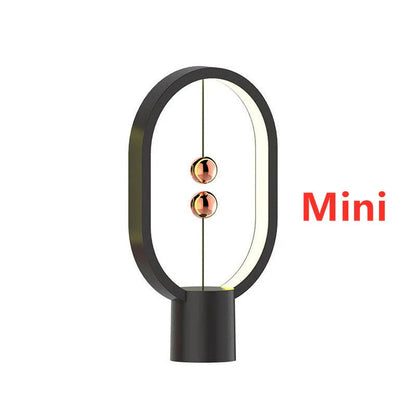 Premium magnetic bedside lamp with dual-colour LED lighting, touch-sensitive dimming controls, and sleek, compact design for bedroom