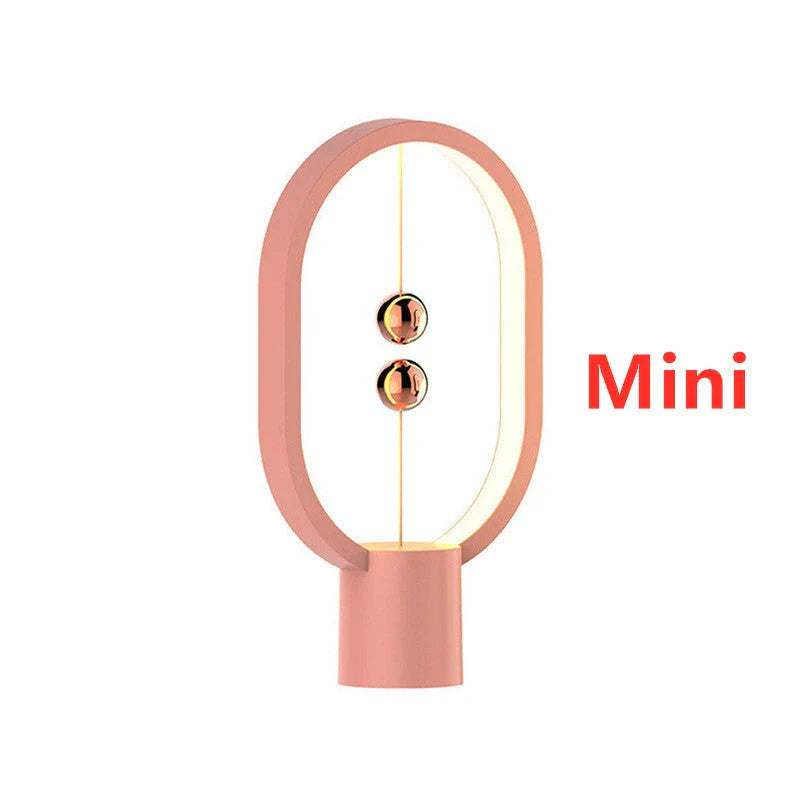 Premium magnetic bedside lamp with dual-colour LED lighting, touch-sensitive dimming controls, and sleek, compact design for bedroom