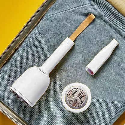 Portable rechargeable vacuum cleaner with hairball trimmer and USB charging