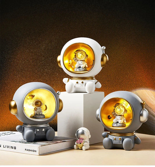Astronaut-themed LED night light piggy bank with hand-painted details