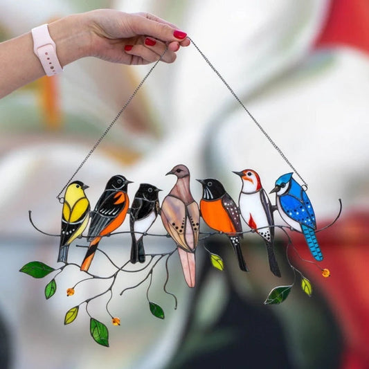 Hand-cut acrylic small bird painted window decoration in vibrant colours