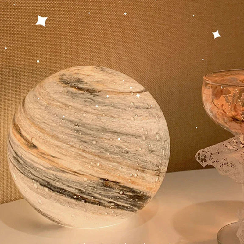 A mesmerising USB-powered night light featuring a captivating wandering earth design and adjustable lighting settings