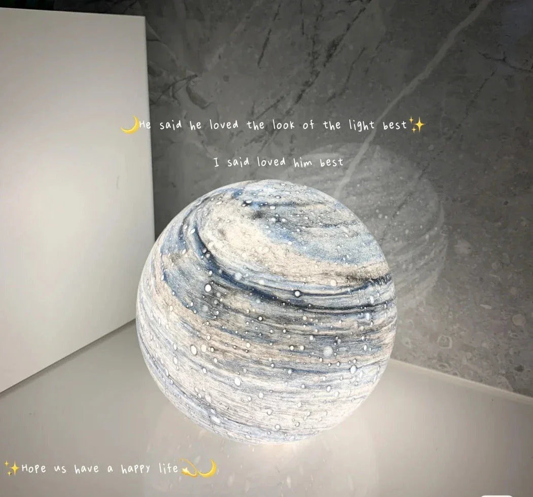 A mesmerising USB-powered night light featuring a captivating wandering earth design and adjustable lighting settings