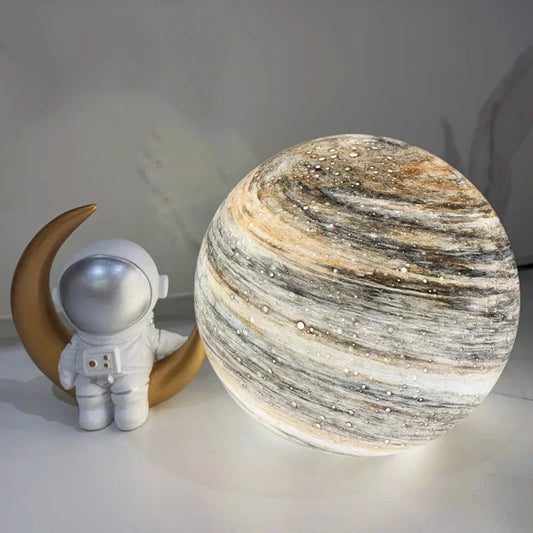 A mesmerising USB-powered night light featuring a captivating wandering earth design and adjustable lighting settings