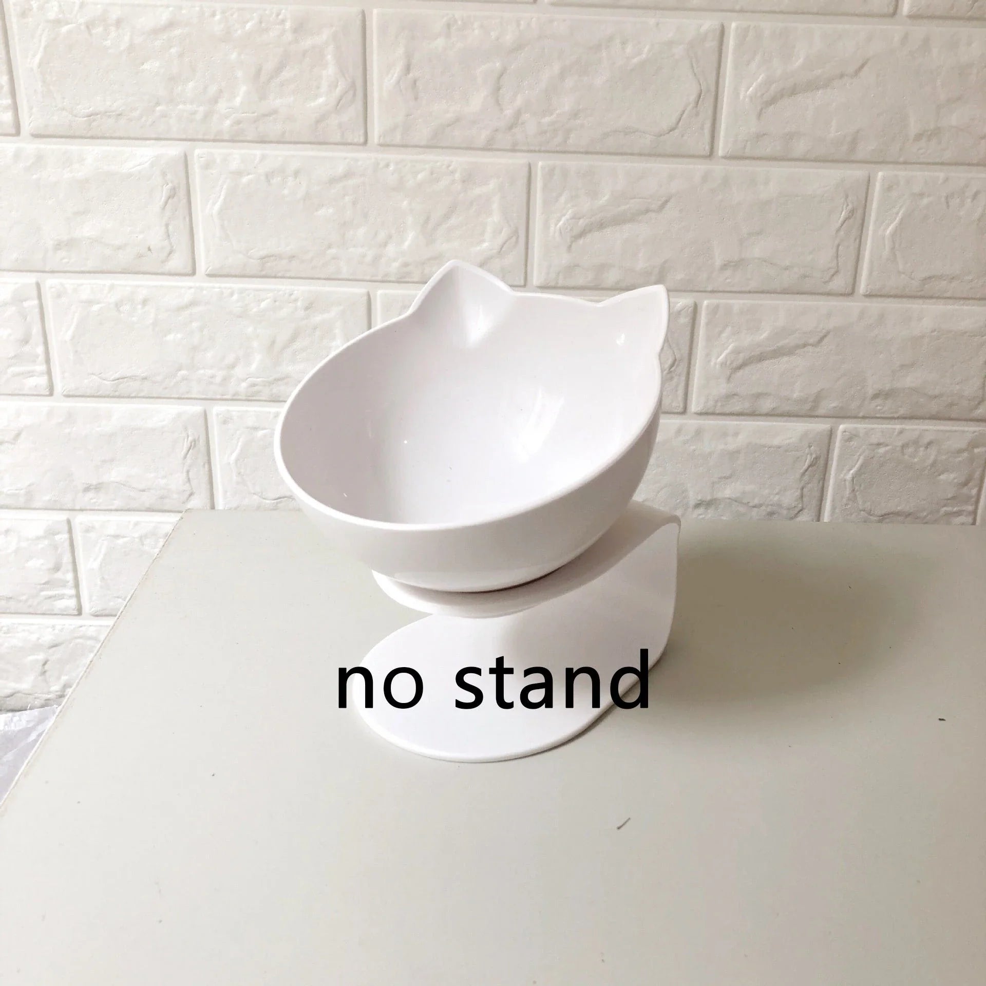 Inclined transparent cat food bowl with a gently sloped base and ergonomic design for whisker-friendly dining