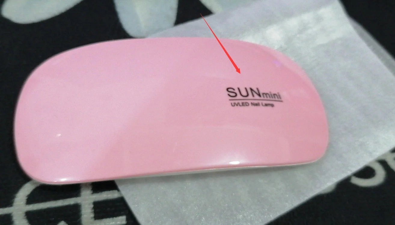 Compact and portable USB-powered nail light therapy machine with adjustable angle and LED light for at-home nail care
