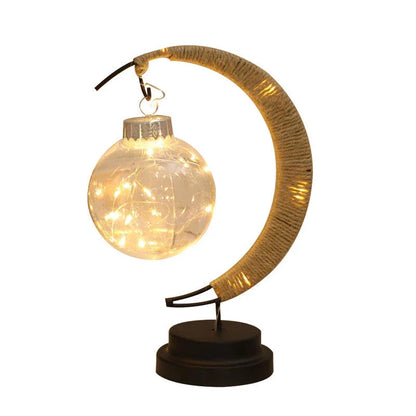 Lunar LED Lamp with crescent-shaped holder, emitting warm, soothing light in a variety of colour options