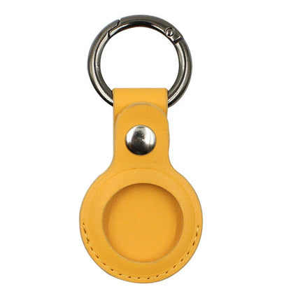 Premium leather AirTag keychain case in various colors, providing durable protection and stylish carry for your Apple tracking device