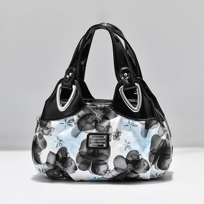 Women's multicolour PU leather dumpling handbag with floral design and multiple pockets