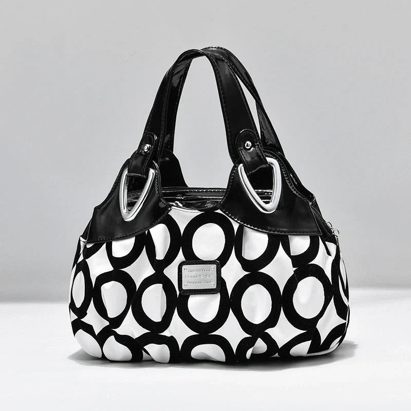 Women's multicolour PU leather dumpling handbag with floral design and multiple pockets