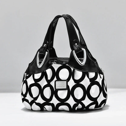 Women's multicolour PU leather dumpling handbag with floral design and multiple pockets