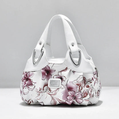 Women's multicolour PU leather dumpling handbag with floral design and multiple pockets