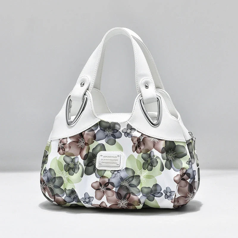 Women's multicolour PU leather dumpling handbag with floral design and multiple pockets