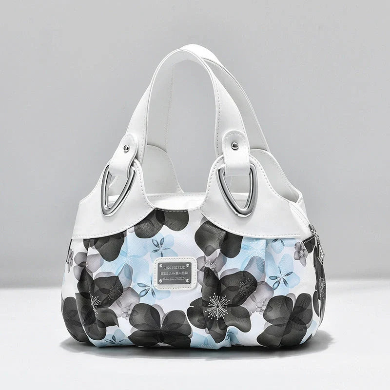 Women's multicolour PU leather dumpling handbag with floral design and multiple pockets