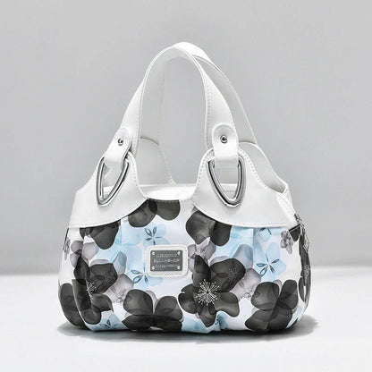 Women's multicolour PU leather dumpling handbag with floral design and multiple pockets