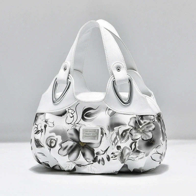 Women's multicolour PU leather dumpling handbag with floral design and multiple pockets