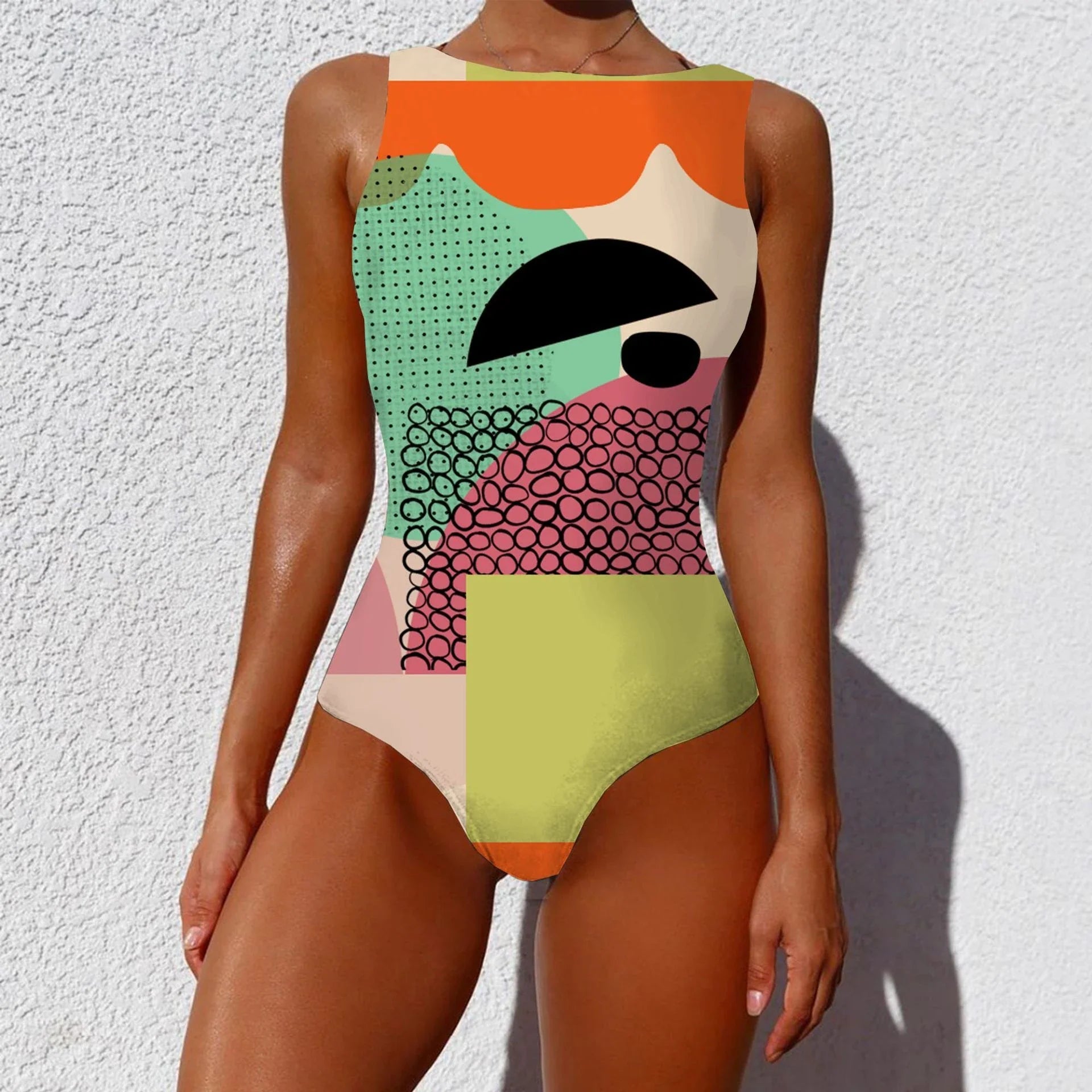 Chic vintage-inspired one-piece swimsuit with various abstract print designs, featuring a sleeveless silhouette and round neckline for a flattering fit.
