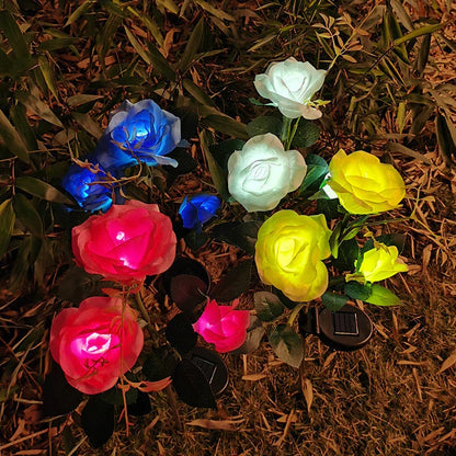 Solar-powered rose flower lights in red, pink, blue, white, and yellow colors for outdoor garden decor