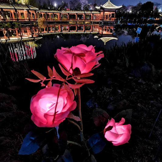 Solar-powered rose flower lights in red, pink, blue, white, and yellow colors for outdoor garden decor