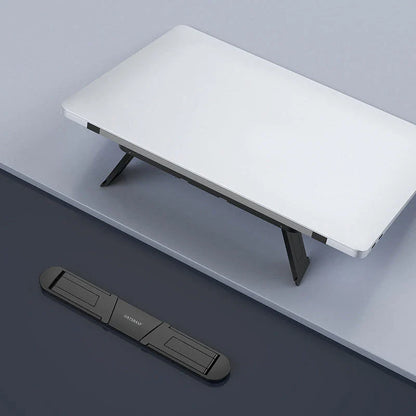 Elegant laptop stand with adjustable viewing angle, sturdy design, and efficient cooling for enhanced productivity
