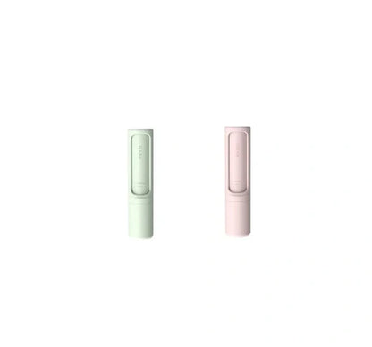 Rotating cylinder electrostatic pet hair remover brush in white, blue, green, and pink