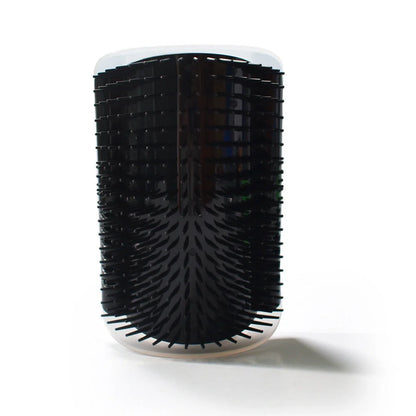 A cat grooming brush made of high-quality plastic, designed with a corner for your cat to rub its face and enjoy a self-massage.