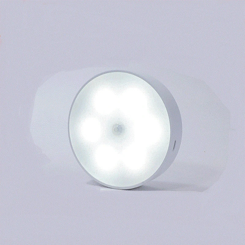 Motion-activated LED puck lights in warm and white color options, with various pack sizes and USB recharging