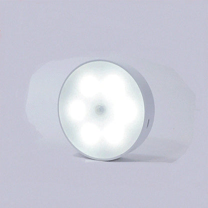 Motion-activated LED puck lights in warm and white color options, with various pack sizes and USB recharging