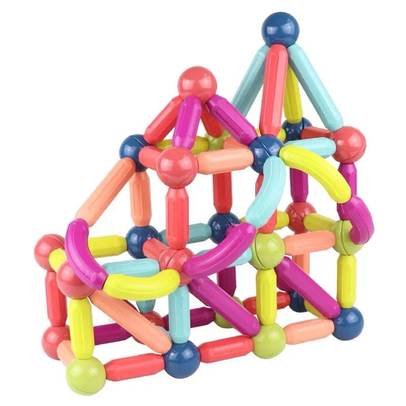 Versatile magnetic construction set with various building blocks and rods, allowing children to create imaginative structures and models