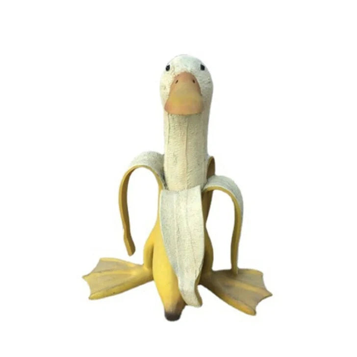 Banana Duck Resin Garden Ornament with vibrant yellow colour and cartoon design