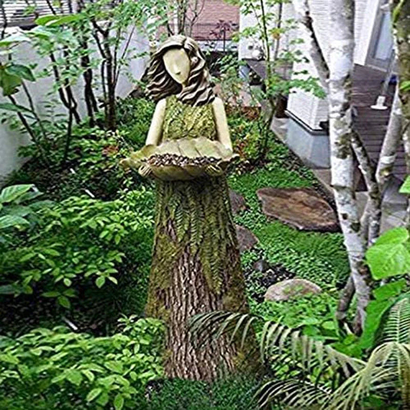 Sherwood Fern Fairy Statuary Resin Bird Feeder with leaf-shaped holder in garden setting
