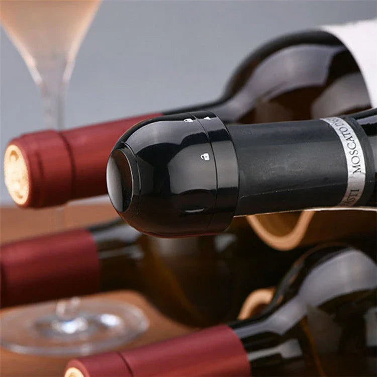 Premium silicone wine and champagne bottle stoppers in black colour, designed to create an airtight seal and lock in freshness