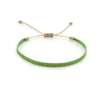 Handcrafted bohemian bracelet with ethnic flair, featuring premium Miyuki DB beads and traditional weaving techniques