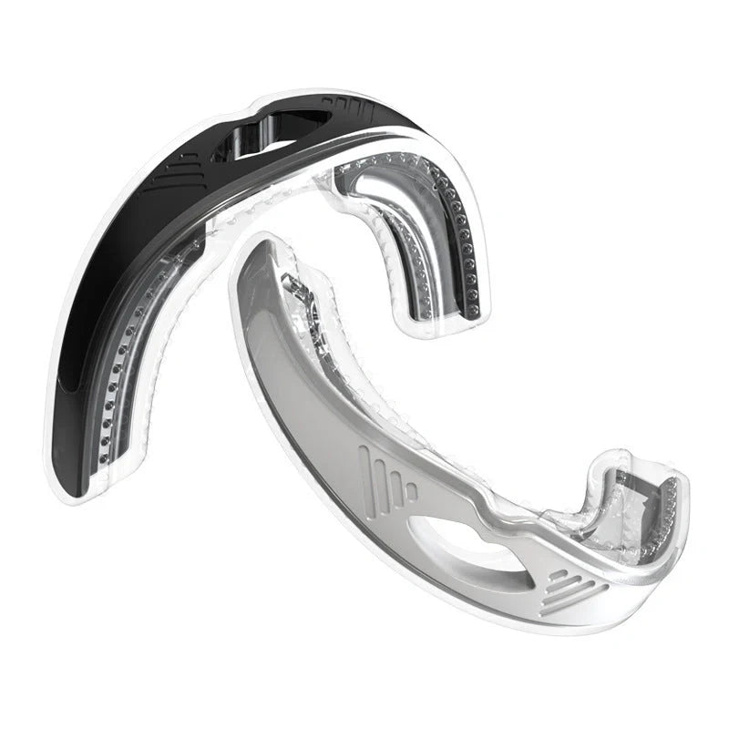 Anti-snoring device braces in white and black, made from food-grade silicone