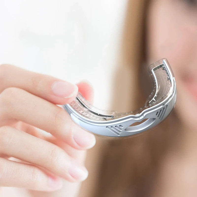 Anti-snoring device braces in white and black, made from food-grade silicone