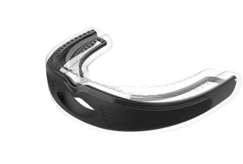 Anti-snoring device braces in white and black, made from food-grade silicone