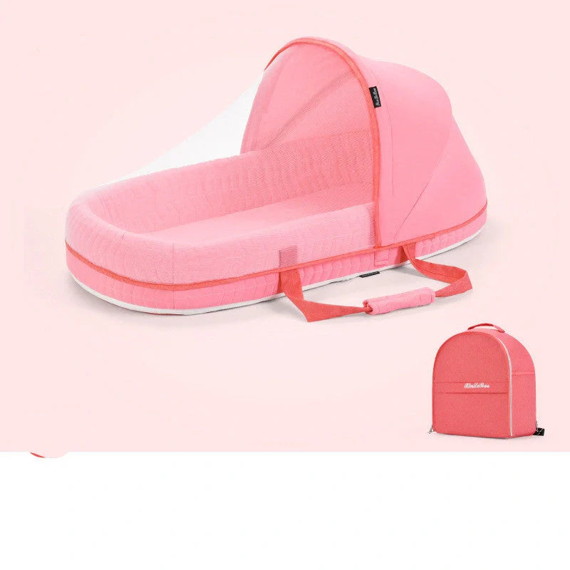 Multifunctional baby crib with sun protection and mosquito net, foldable for easy transport