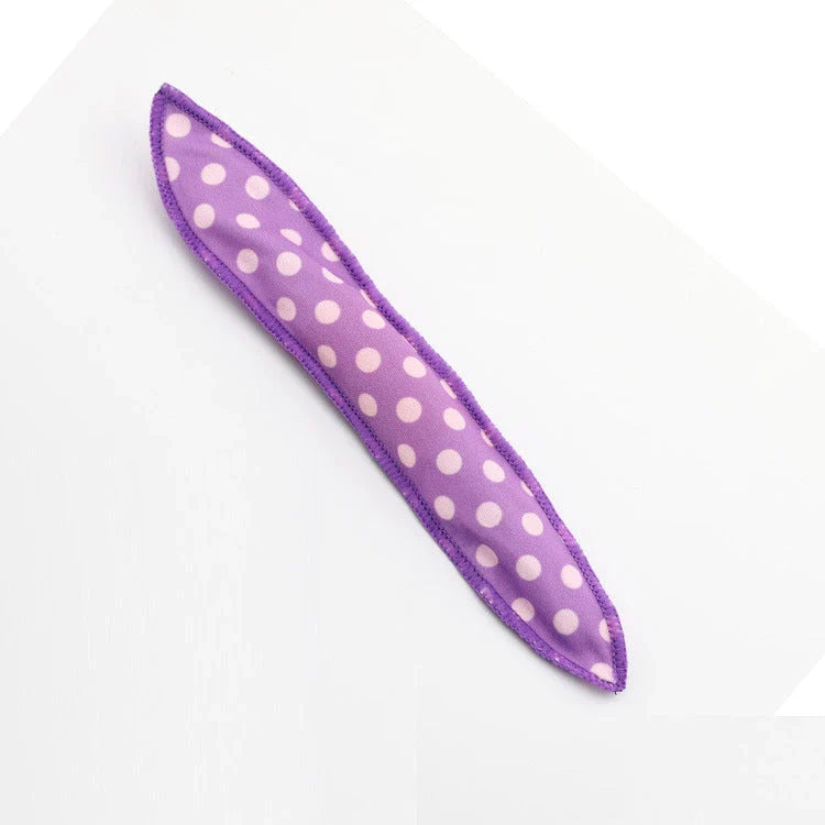 Soft, cushioned hair curler in various colours for creating effortless waves and curls while you sleep