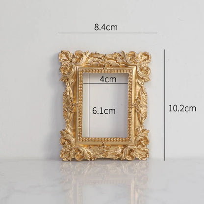 Golden Retro Photo Frame displaying jewellery and art in a Nordic-style resin design