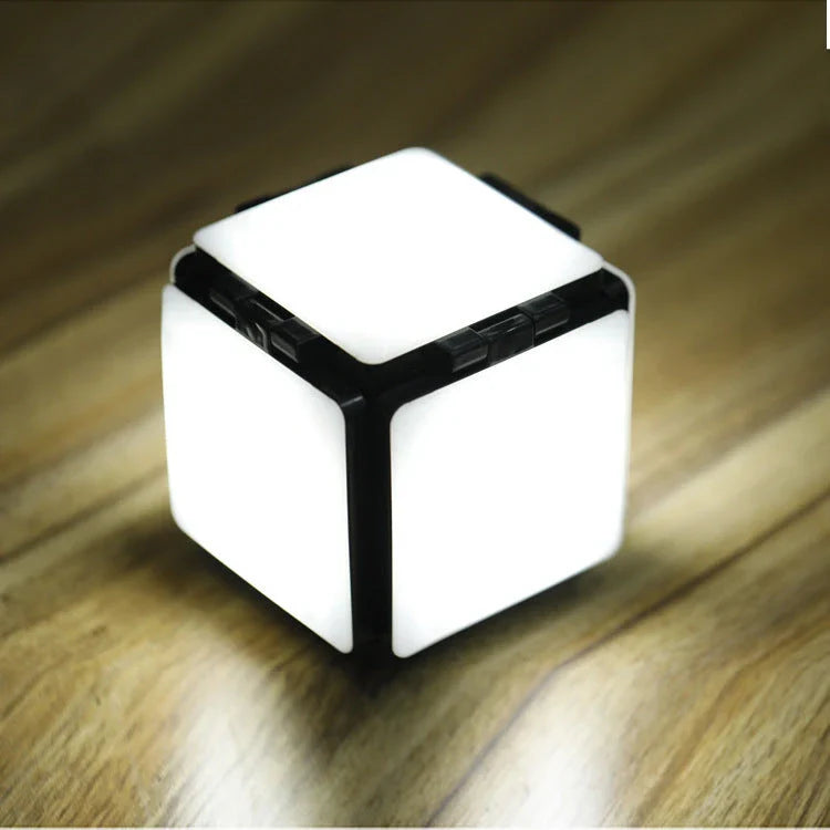 Square LED bedside lamp with folding design and adjustable brightness settings