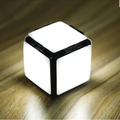 Square LED bedside lamp with folding design and adjustable brightness settings