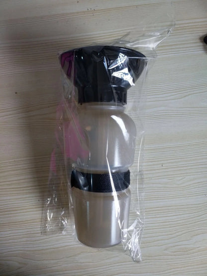 Portable pet water bottle with squeeze-feed bowl for dogs and cats