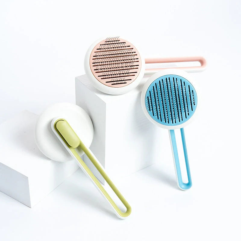 Automatic pet hair remover brush in pink, blue, and green options