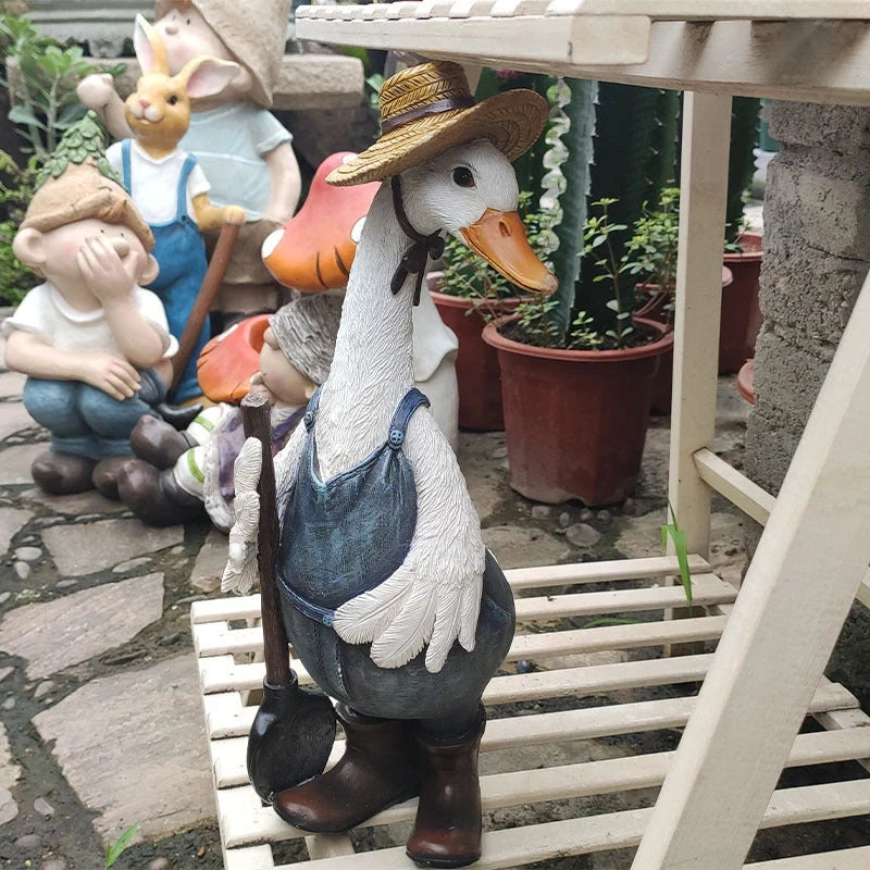 Resin duck outdoor statue for garden decoration with detailed design and stable base