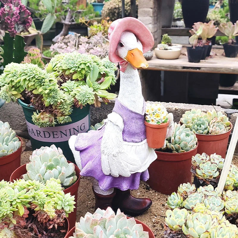 Resin duck outdoor statue for garden decoration with detailed design and stable base