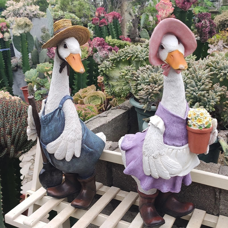 Resin duck outdoor statue for garden decoration with detailed design and stable base