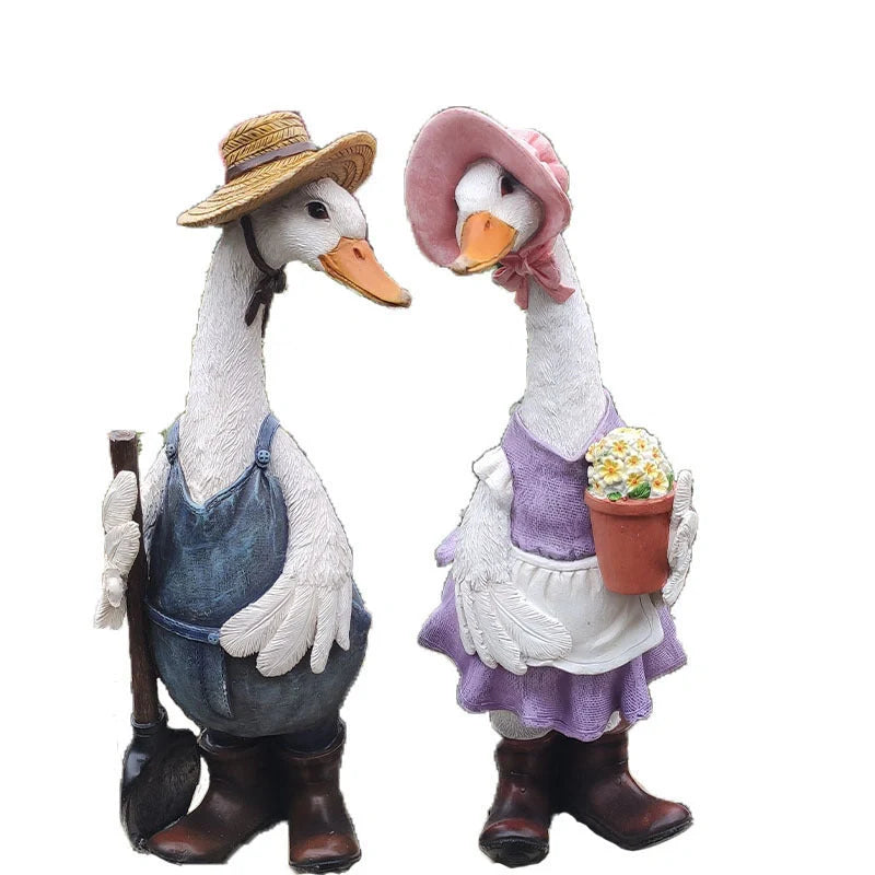 Resin duck outdoor statue for garden decoration with detailed design and stable base
