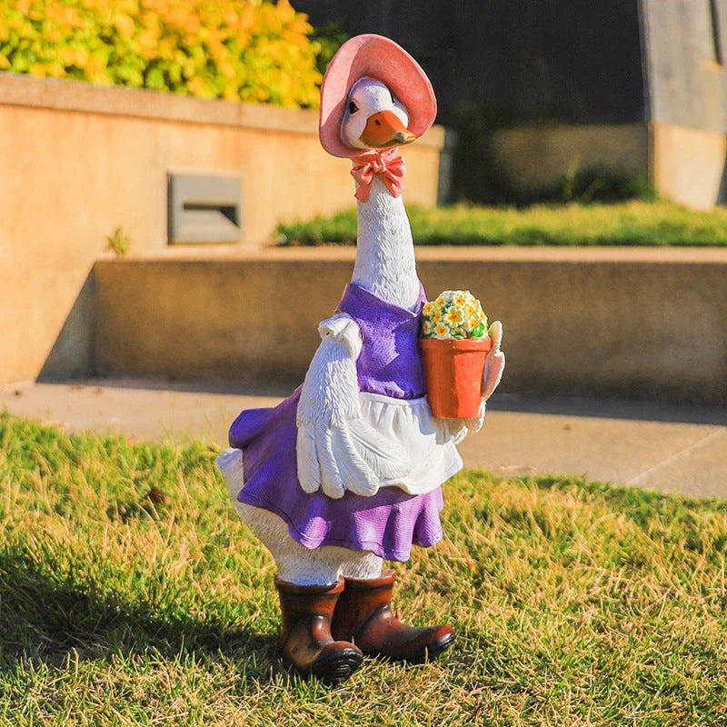 Resin duck outdoor statue for garden decoration with detailed design and stable base